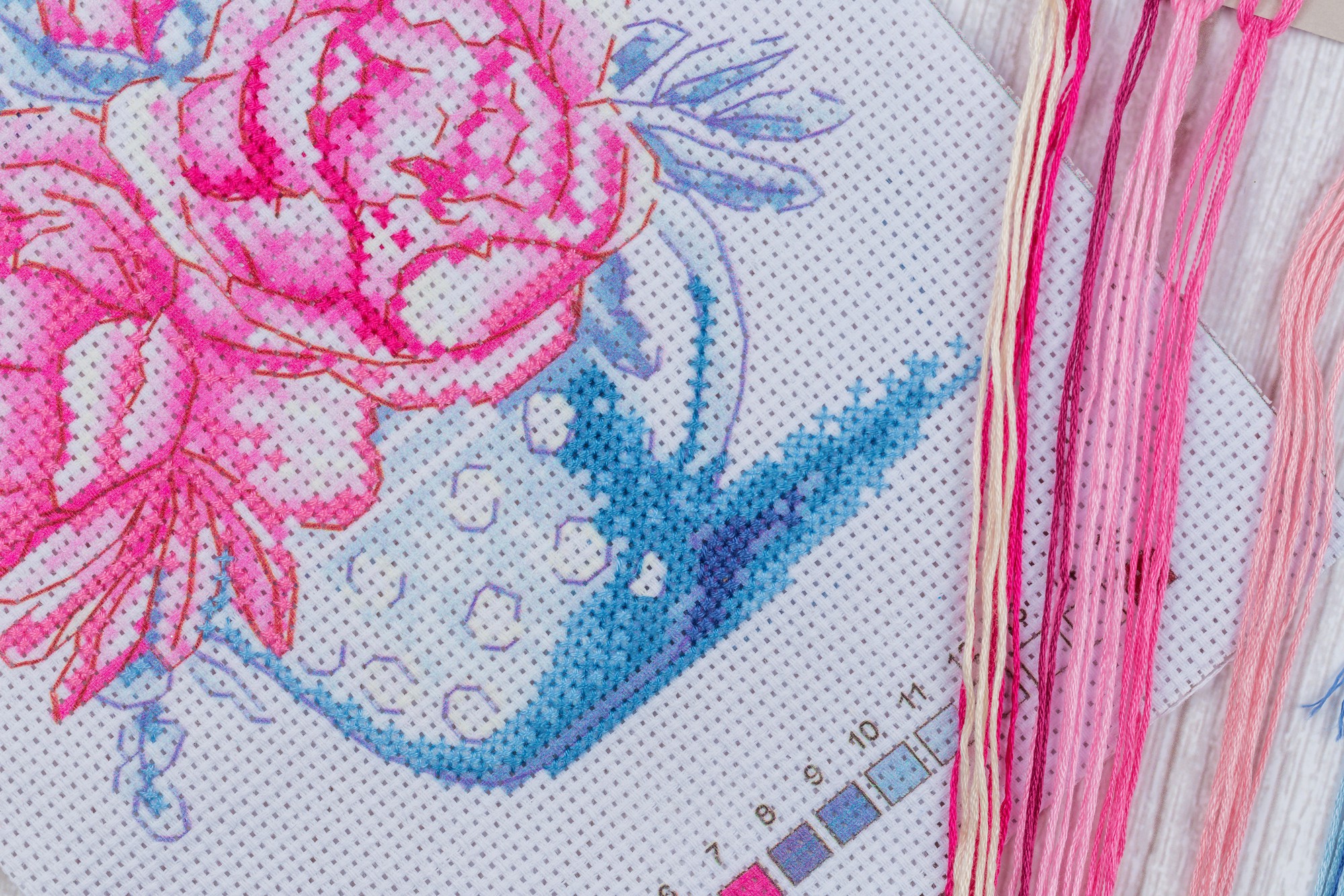 large embroidered textile with layered motifs
