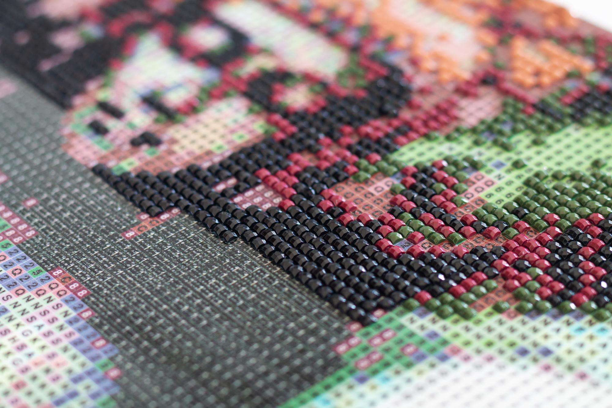 close-up modern embroidered textile with geometric pattern